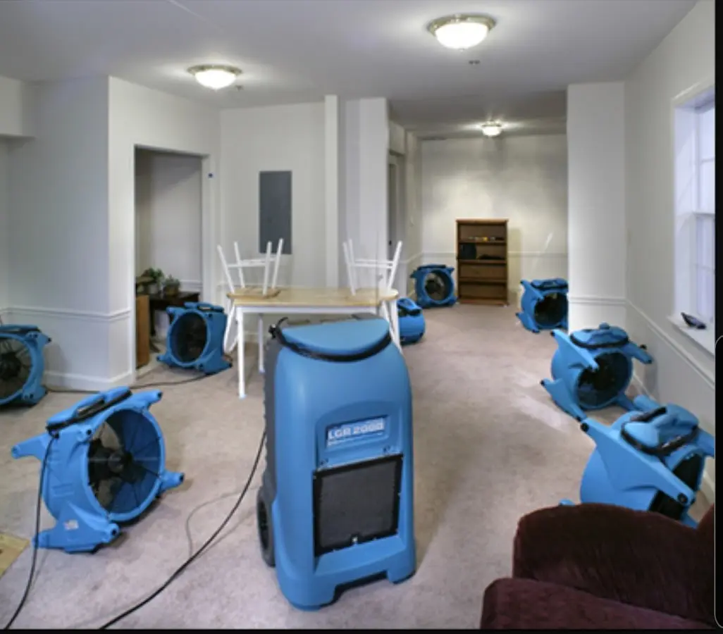 Air movers and dehumidifier setup for Water Damage Restoration in Medford